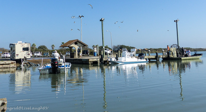 Boat & RV left side-This is our 82 yr old neighbor who is an avid fisherman. He launches, docks, does everything himself and never gets his feet wet! Winters here and spends summers in Montana