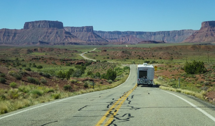 RV traveling down a deserted road in Utah