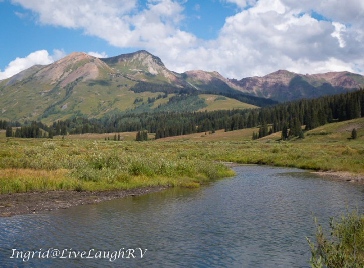 Crested Butte, Colorado, a creek flowing in the foreground with mountains in the background
