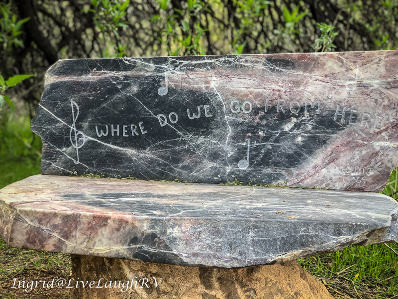 quote carved in a stone bench Where do we go from here